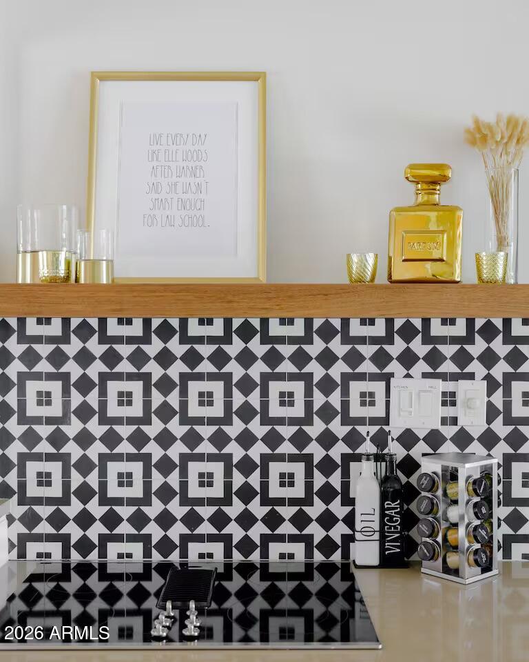 6810 East Granada Road Scottsdale, AZ 85257 - Photo 11 of 34 a bathroom with a black and white checkered floor