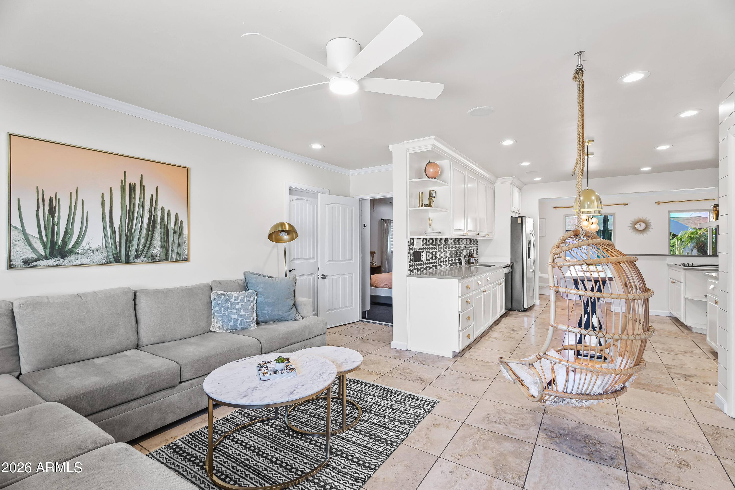 6810 East Granada Road Scottsdale, AZ 85257 - Photo 16 of 34 a living room with furniture and kitchen view