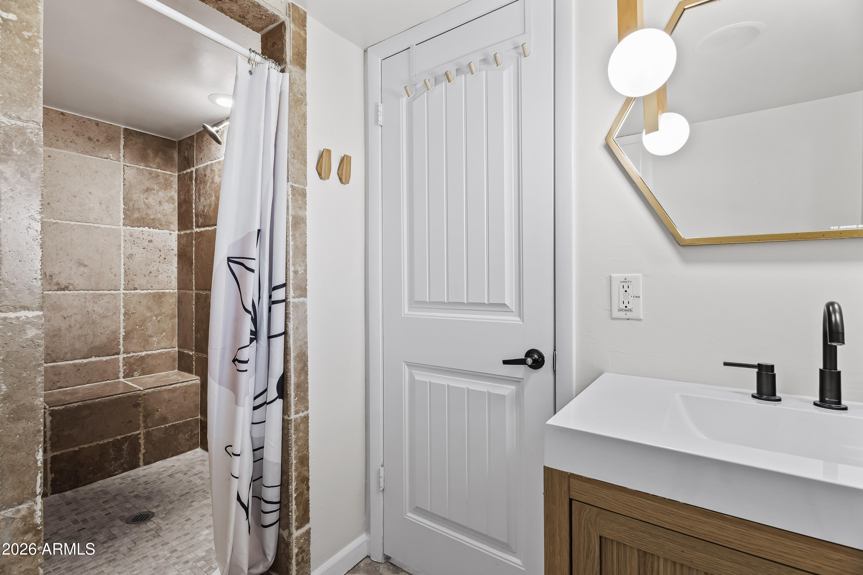 6810 East Granada Road Scottsdale, AZ 85257 - Photo 20 of 34 a bathroom with a shower and a sink