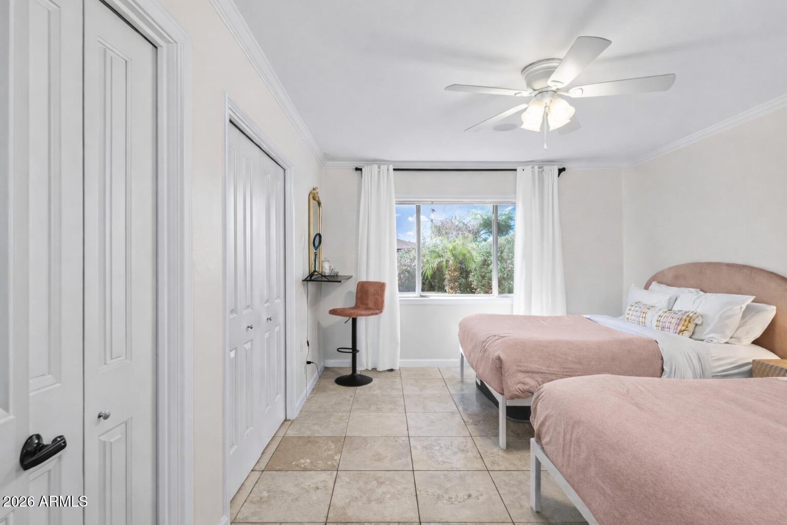 6810 East Granada Road Scottsdale, AZ 85257 - Photo 22 of 34 a living room with furniture and a window