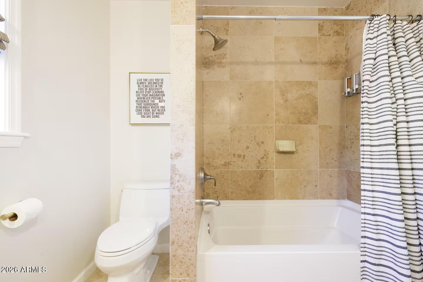 6810 East Granada Road Scottsdale, AZ 85257 - Photo 25 of 34 a bath tub sitting next to a white toilet