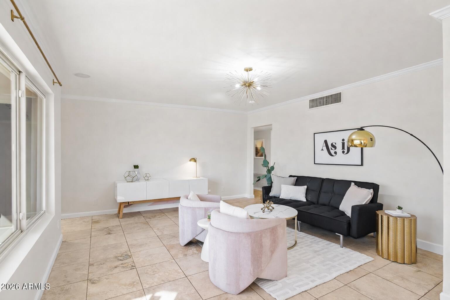 6810 East Granada Road Scottsdale, AZ 85257 - Photo 4 of 34 a living room with furniture and a table