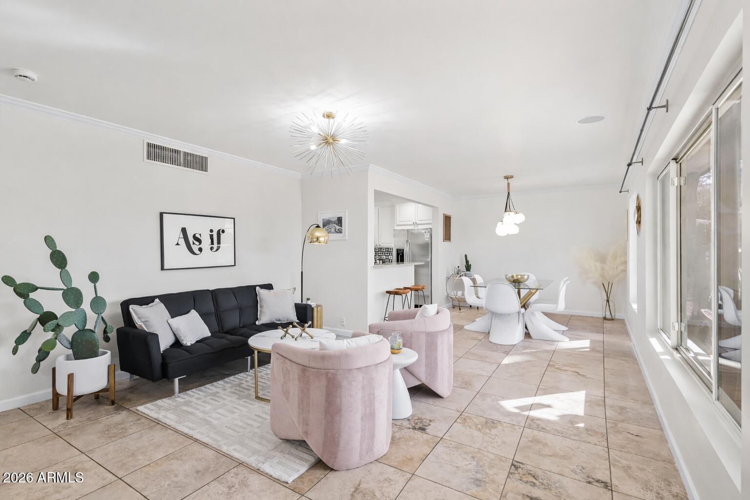 6810 East Granada Road Scottsdale, AZ 85257 - Photo 5 of 34 a living room with furniture and a potted plant