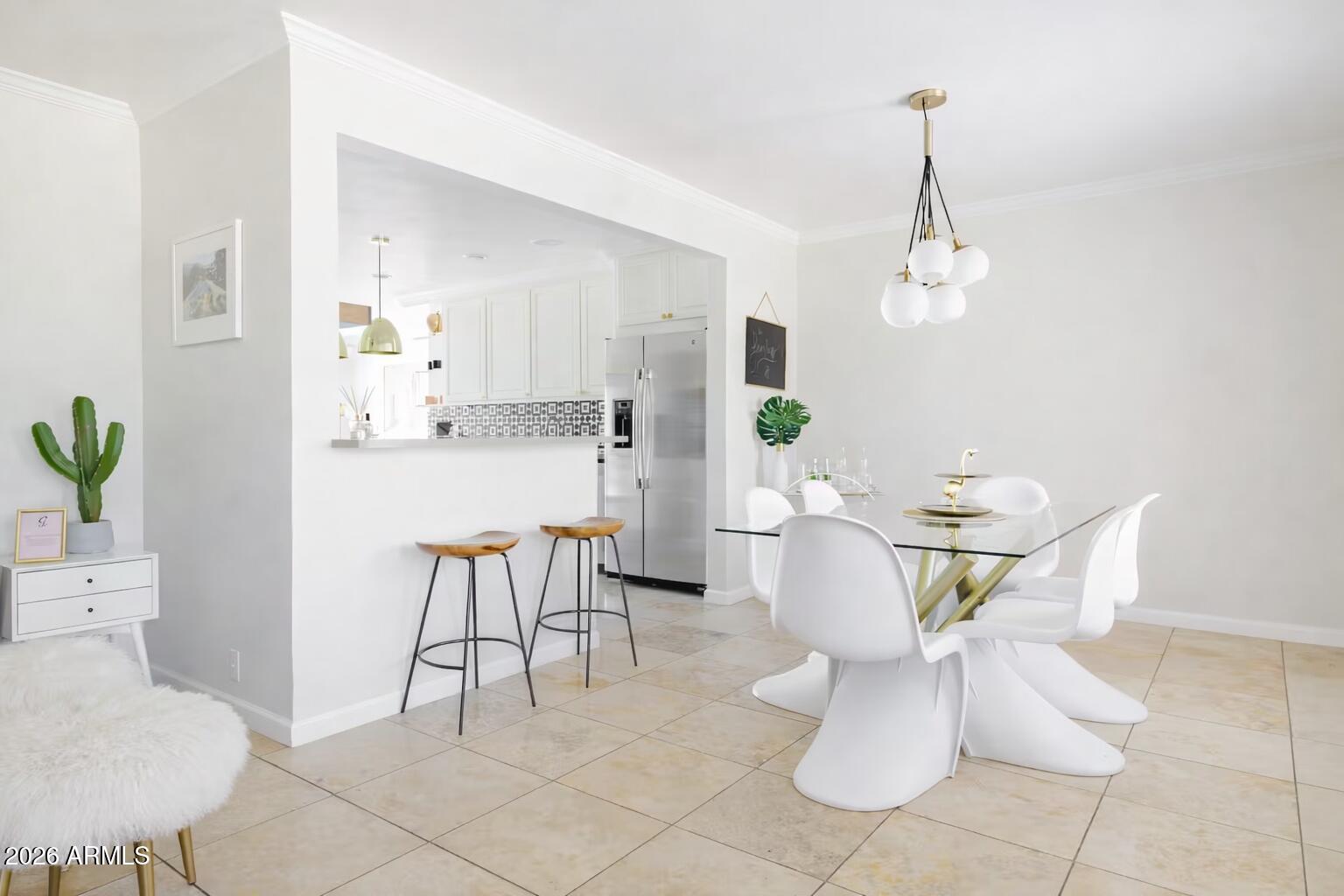 6810 East Granada Road Scottsdale, AZ 85257 - Photo 7 of 34 a living room with furniture and a table
