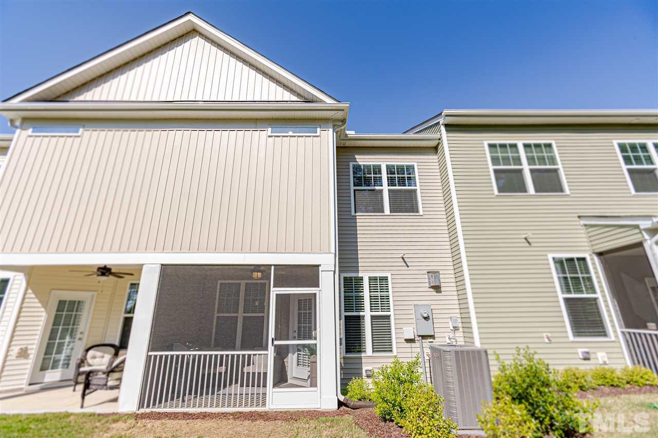6123 Beale Loop Raleigh, NC 27616 - Photo 26 of 30 a front view of a house with garage
