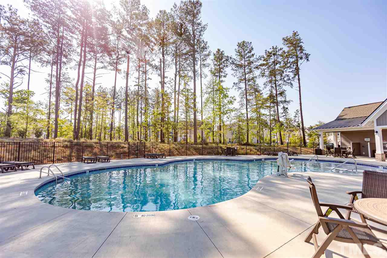 6123 Beale Loop Raleigh, NC 27616 - Photo 29 of 30 a view of swimming pool with outdoor seating