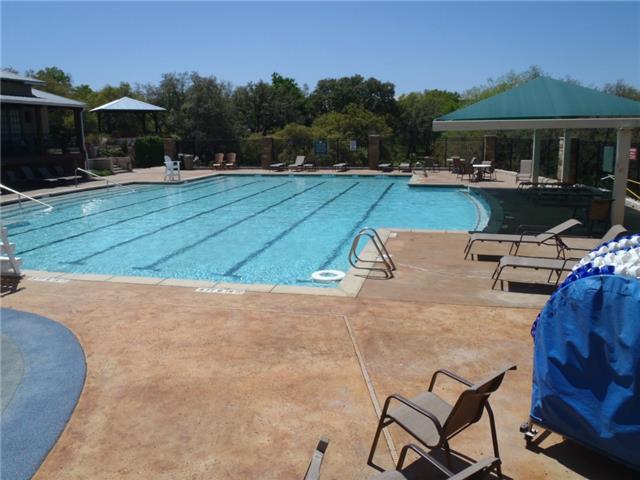 10700 Pointe View Drive Austin, TX 78738 - Photo 19 of 19 a view of a house with backyard patio and outdoor kitchen