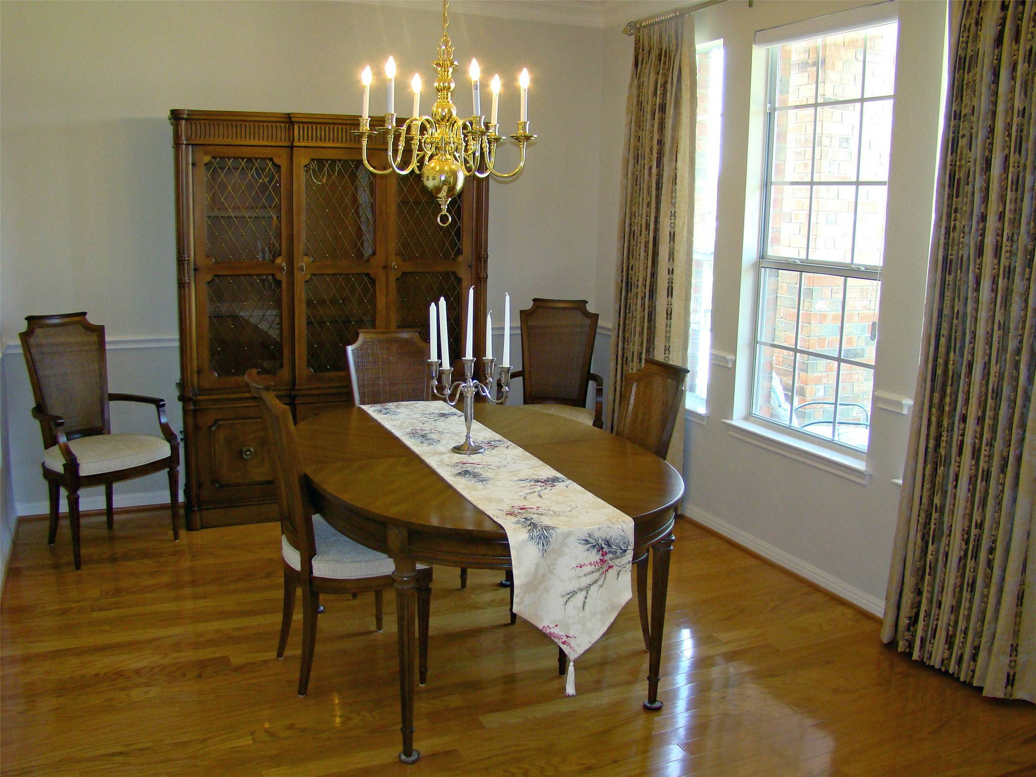 10700 Pointe View Drive Austin, TX 78738 - Photo 8 of 22 Dining space featuring wood finished floors and hanging lights