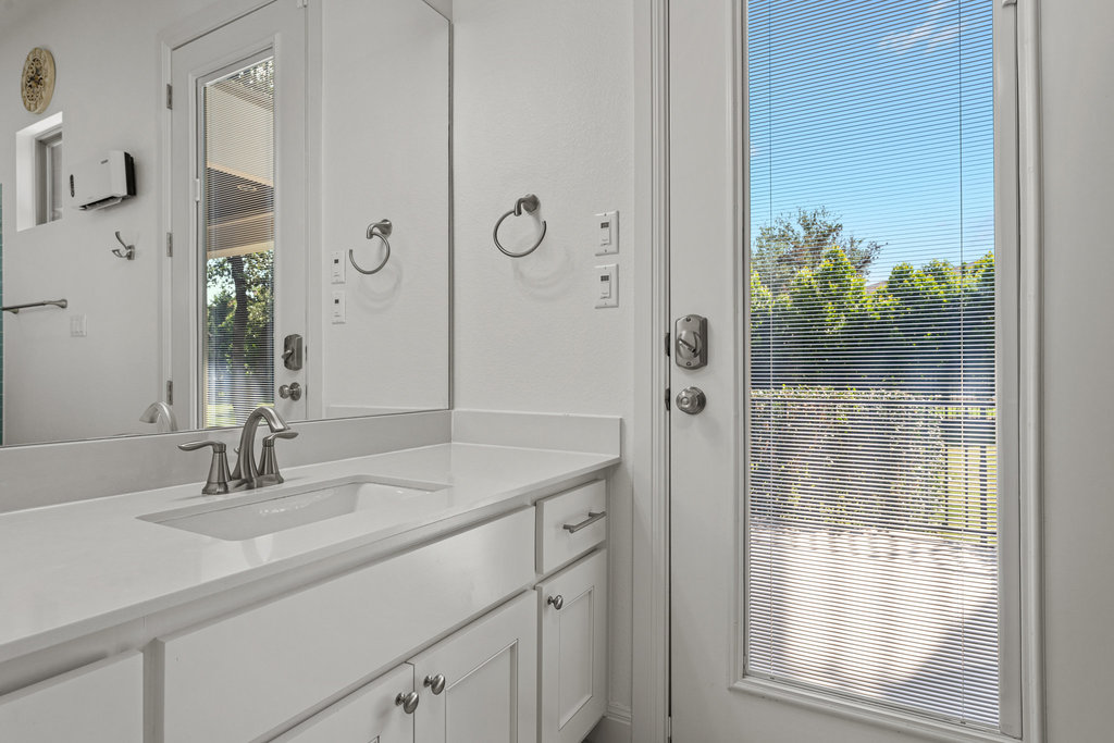 406 Woodside Terrace Austin, TX 78738 - Photo 18 of 34 Ensuite bathroom connected to downstairs bedroom 2. Could be future pool bath.