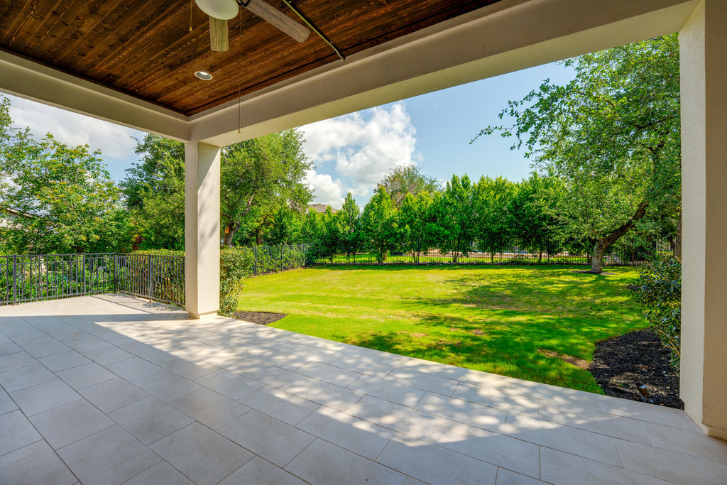 406 Woodside Terrace Austin, TX 78738 - Photo 19 of 34 Covered back patio that with flat backyard perfect for your dream pool