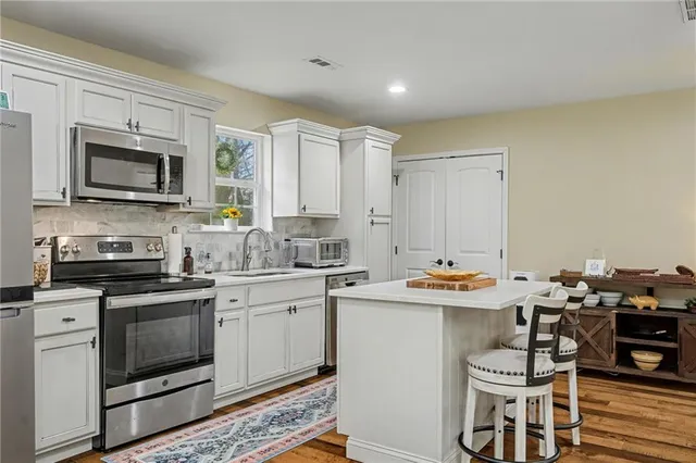 a view of storage and utility room with washer and dryer