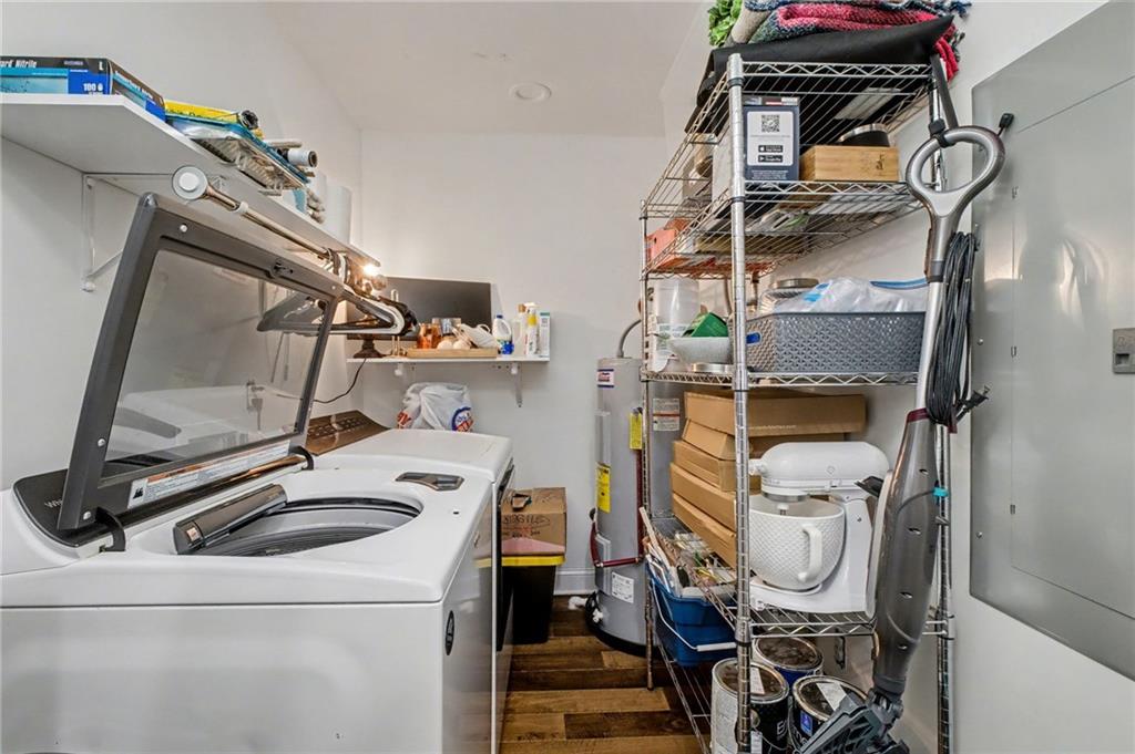 4843 Calhoun Road Northeast Rome, GA 30161 - Photo 22 of 56 a view of storage and utility room with washer and dryer