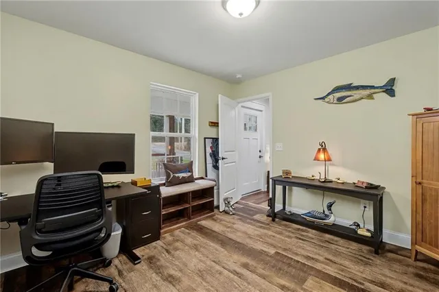 a view of a workspace with furniture