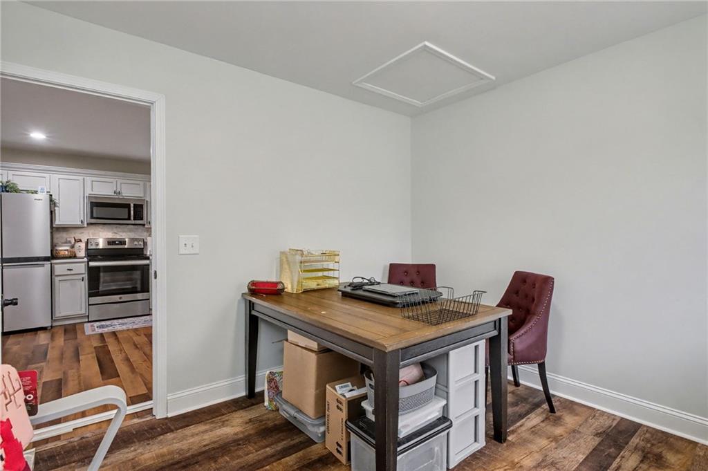 4843 Calhoun Road Northeast Rome, GA 30161 - Photo 35 of 56 a view of a workspace with furniture
