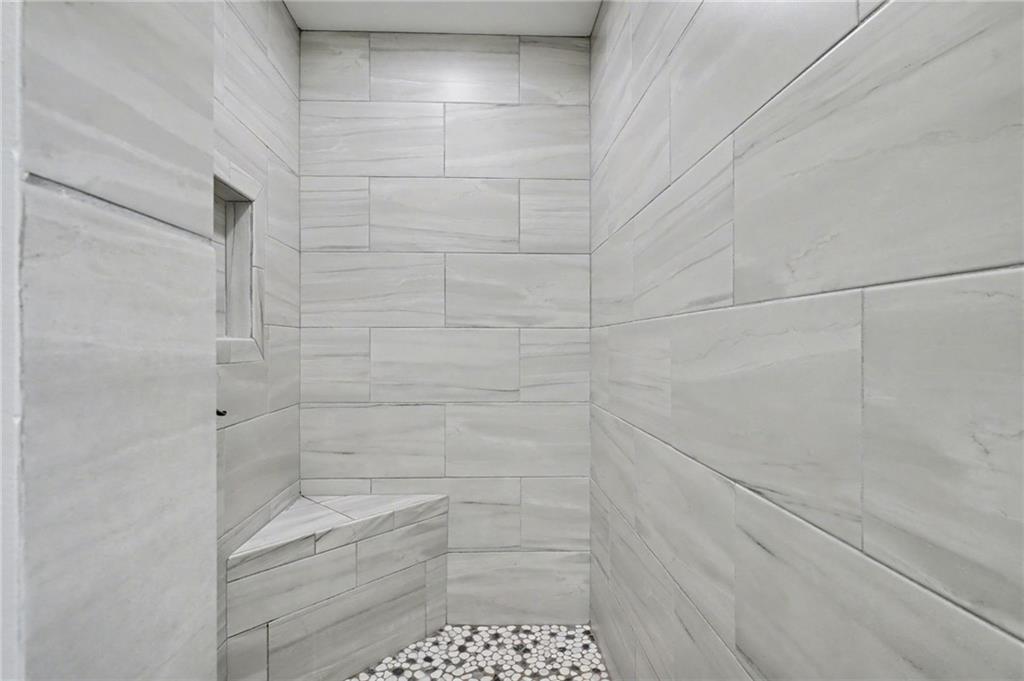 4843 Calhoun Road Northeast Rome, GA 30161 - Photo 37 of 56 a bathroom with a shower