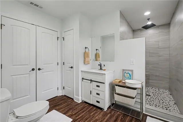 a view of a house with a yard and sitting area