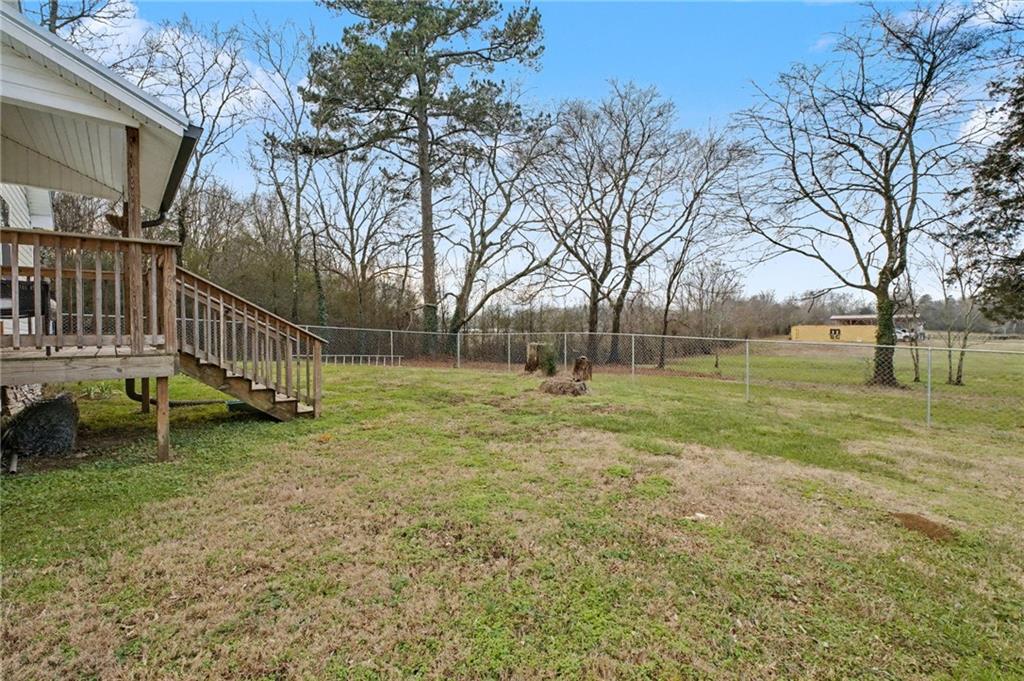 4843 Calhoun Road Northeast Rome, GA 30161 - Photo 49 of 56 a view of a yard with a house