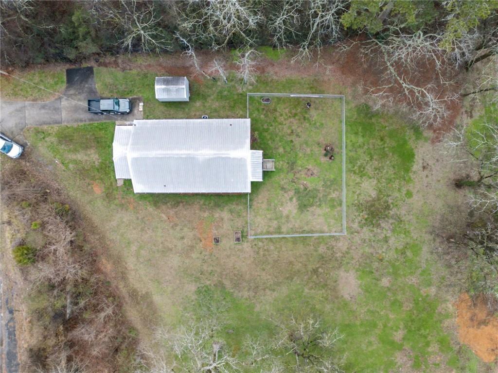 4843 Calhoun Road Northeast Rome, GA 30161 - Photo 51 of 56 a view of a tiny house with a yard