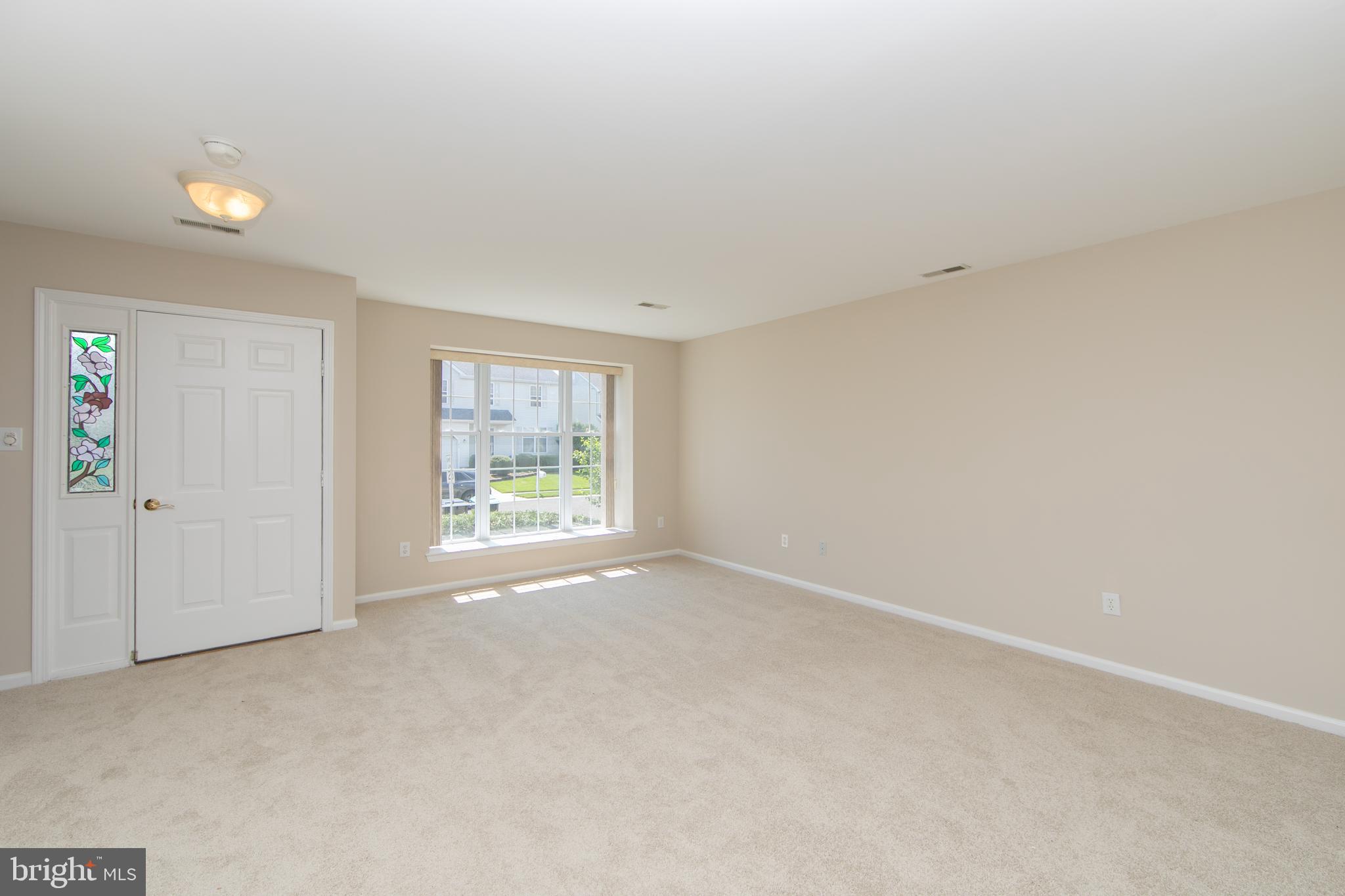 37 Wakefield Road Atco, NJ 08004 - Photo 11 of 39 an empty room with windows