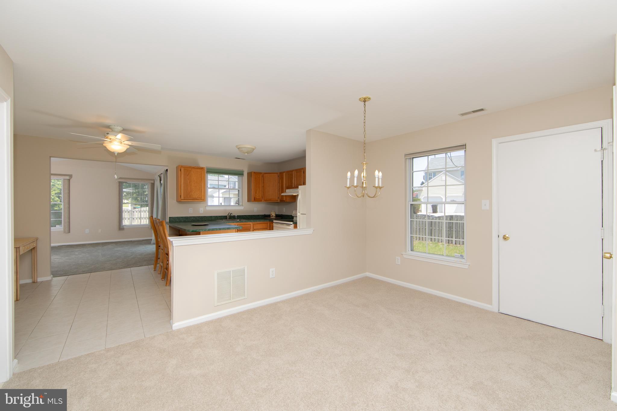 37 Wakefield Road Atco, NJ 08004 - Photo 13 of 39 a view of a kitchen and a refrigerator