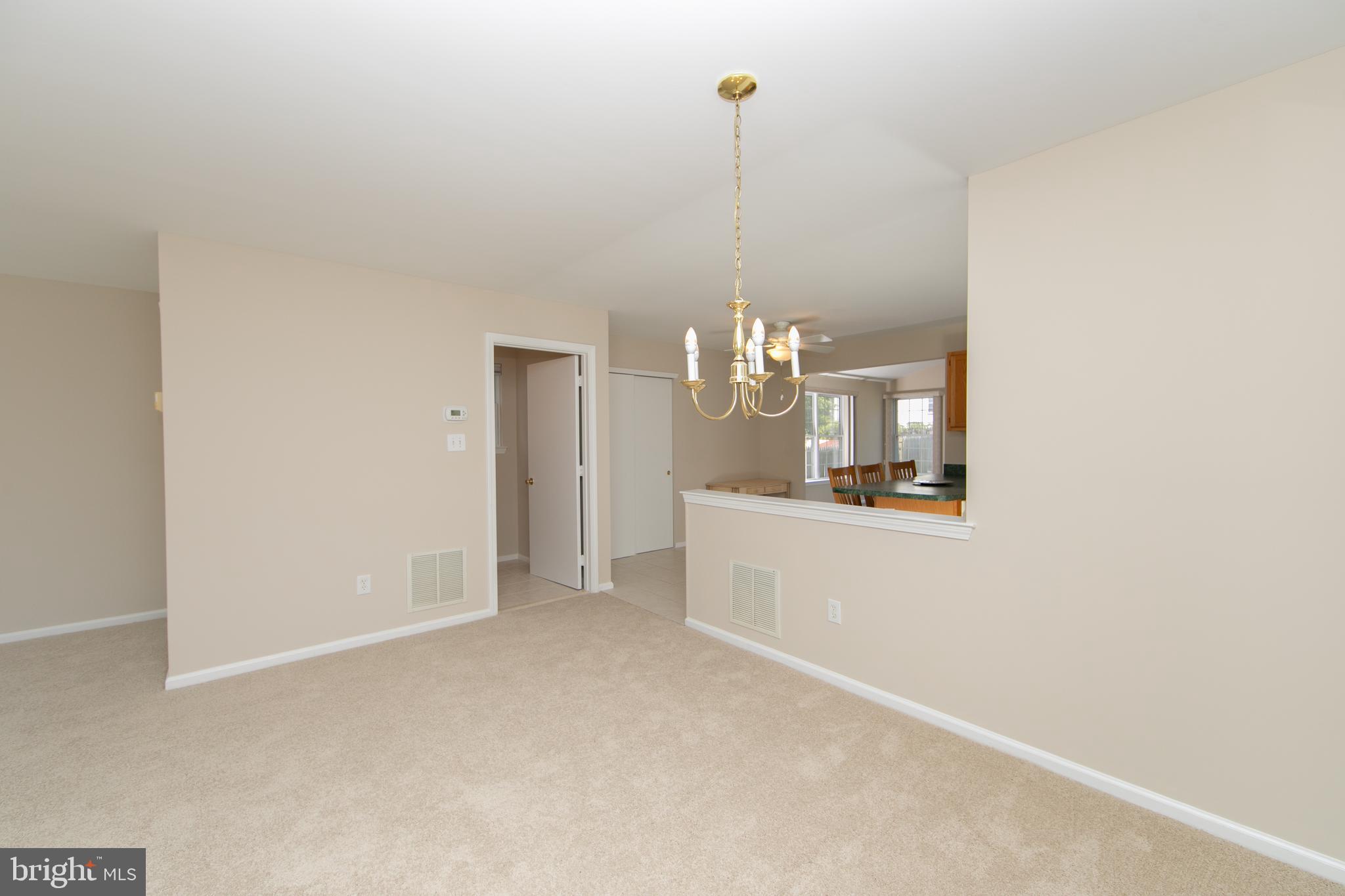 37 Wakefield Road Atco, NJ 08004 - Photo 14 of 39 a view of a room with cabinet and chandelier