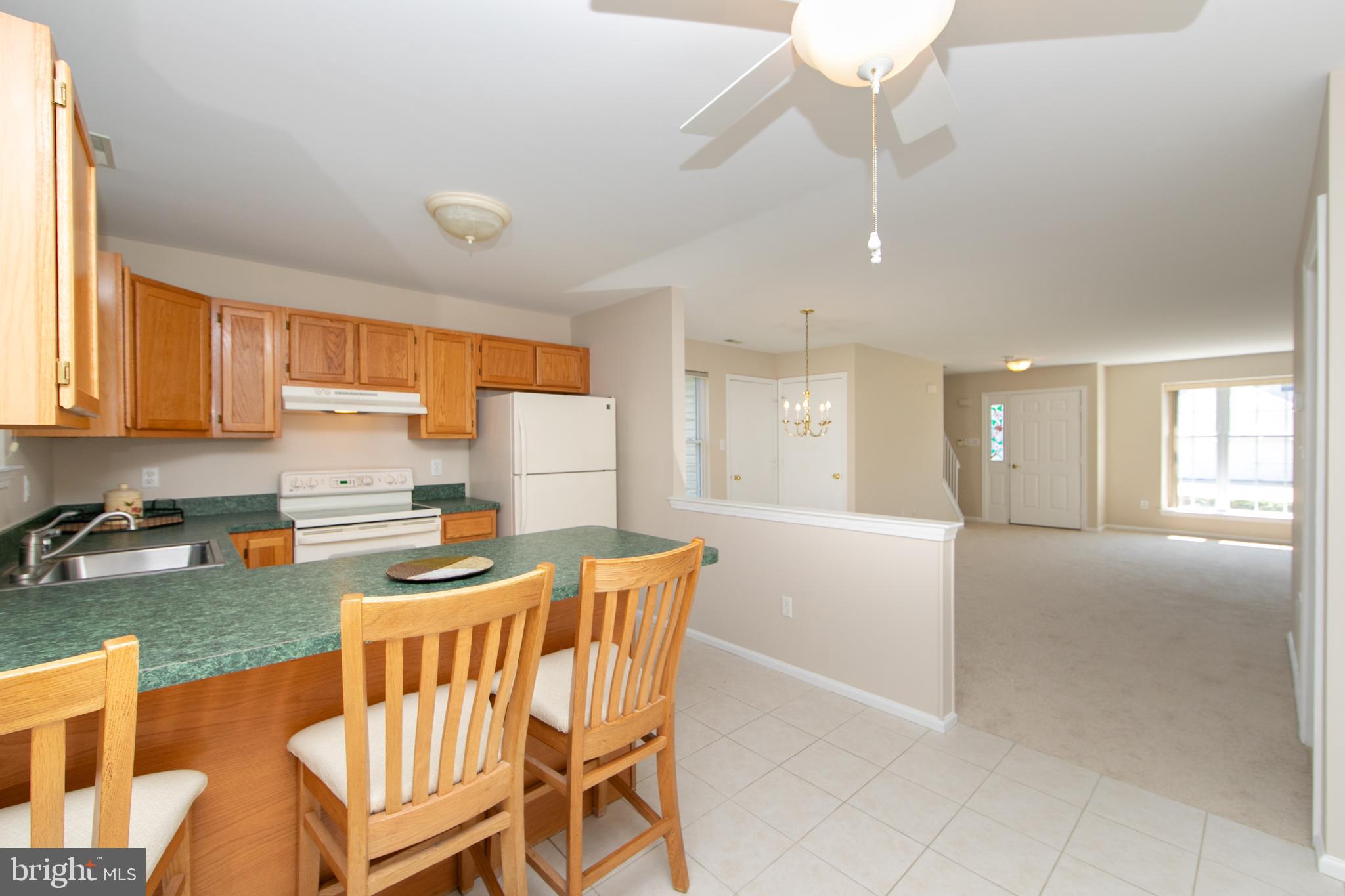 37 Wakefield Road Atco, NJ 08004 - Photo 17 of 39 a view of a dining room with furniture and a kitchen