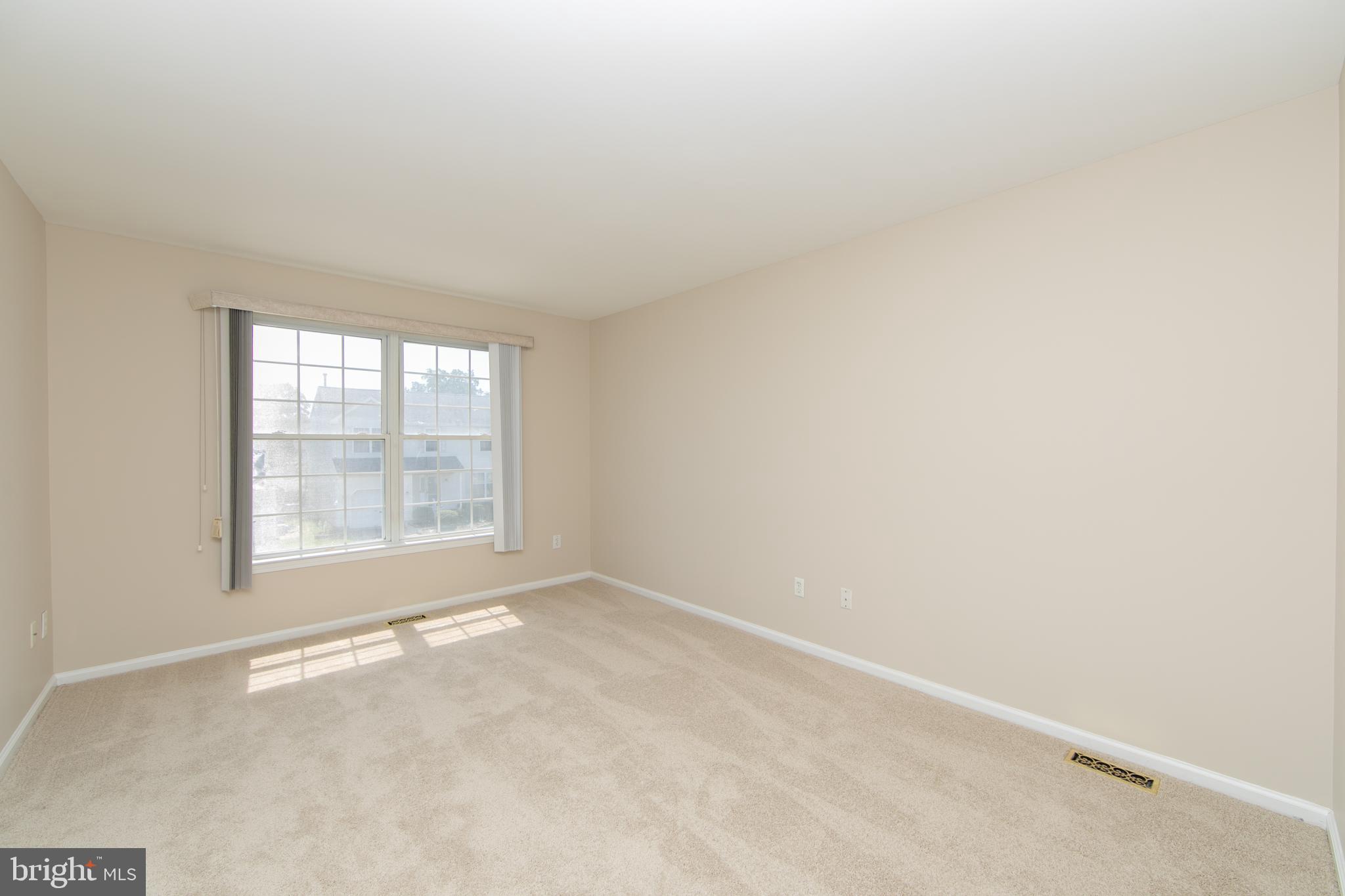 37 Wakefield Road Atco, NJ 08004 - Photo 25 of 39 an empty room with a window