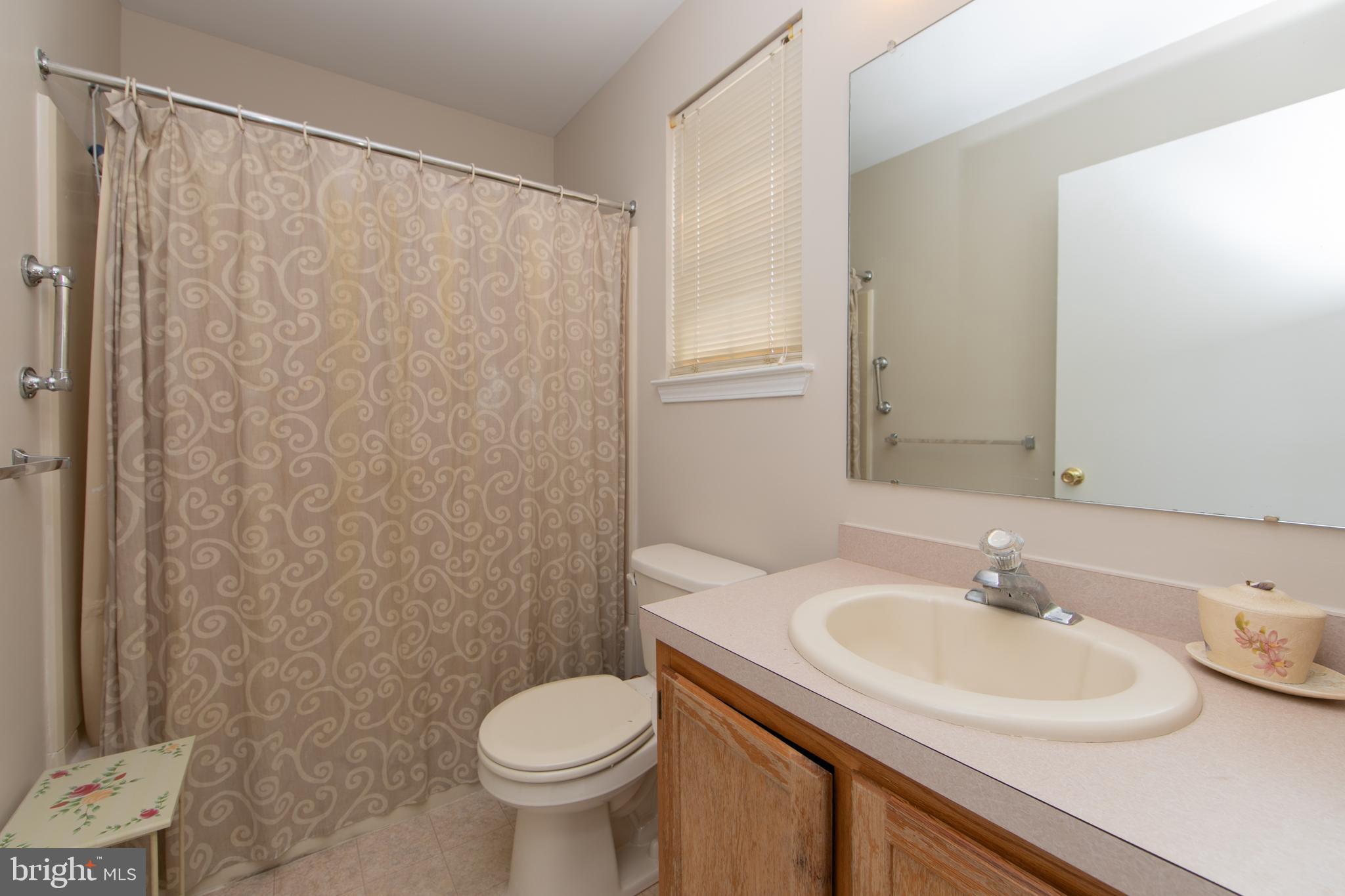 37 Wakefield Road Atco, NJ 08004 - Photo 28 of 39 a bathroom with a sink and a toilet