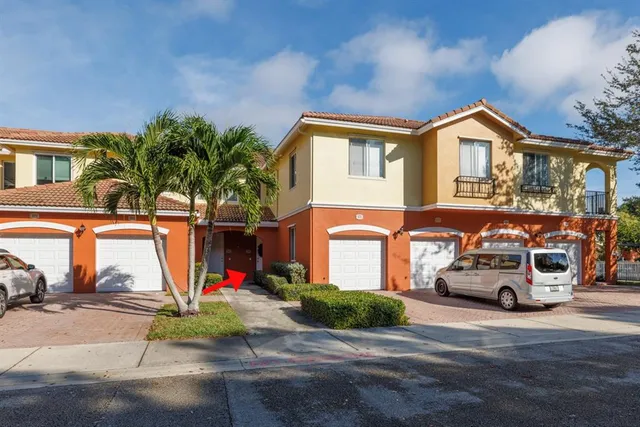 a car parked in front of a house