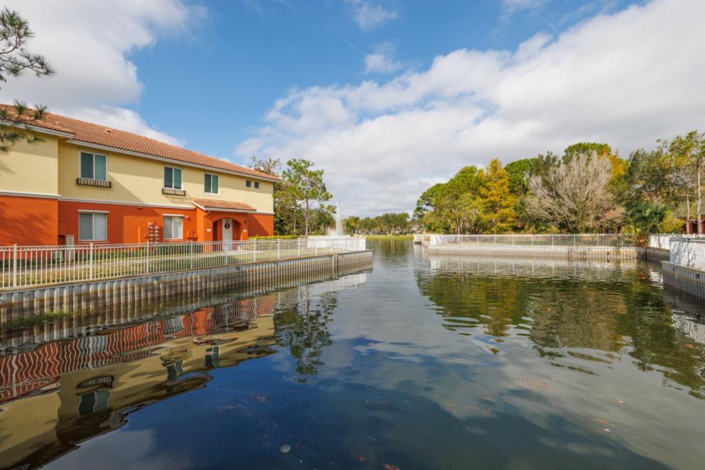 55 Southeast Palermo, Unit 105 Stuart, FL 34994 - Photo 8 of 40 a view of building with lake view