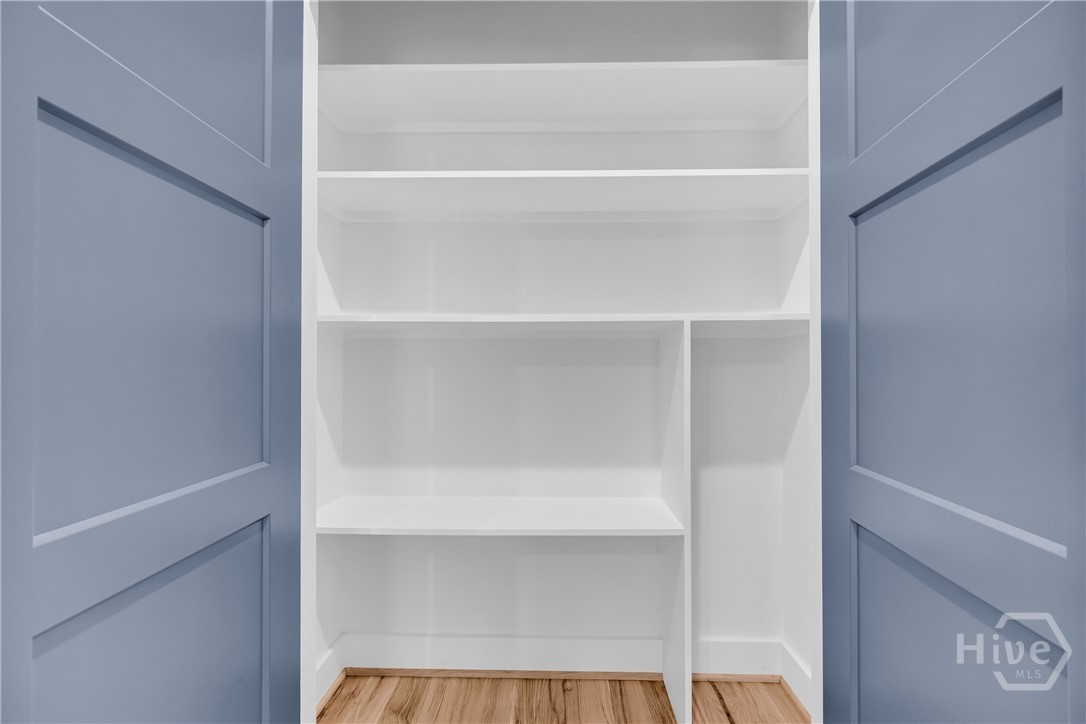 2476 St Martin Way Monroe, GA 30656 - Photo 53 of 75 Hall Linen Closet with Vacuum Storage space