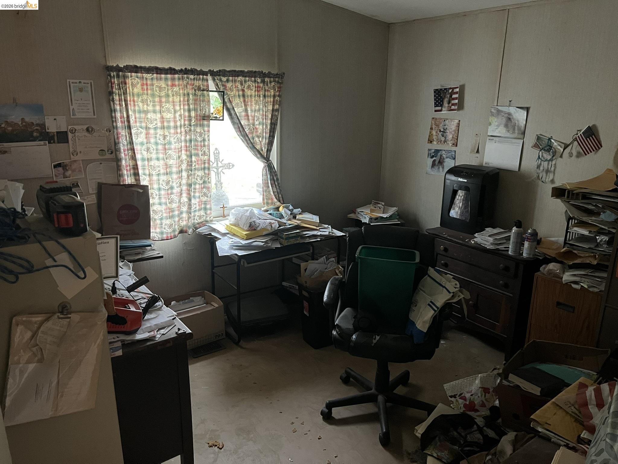 19644 Rawhide Road Sonora, CA 95370 - Photo 17 of 45 Home office with unfinished concrete flooring