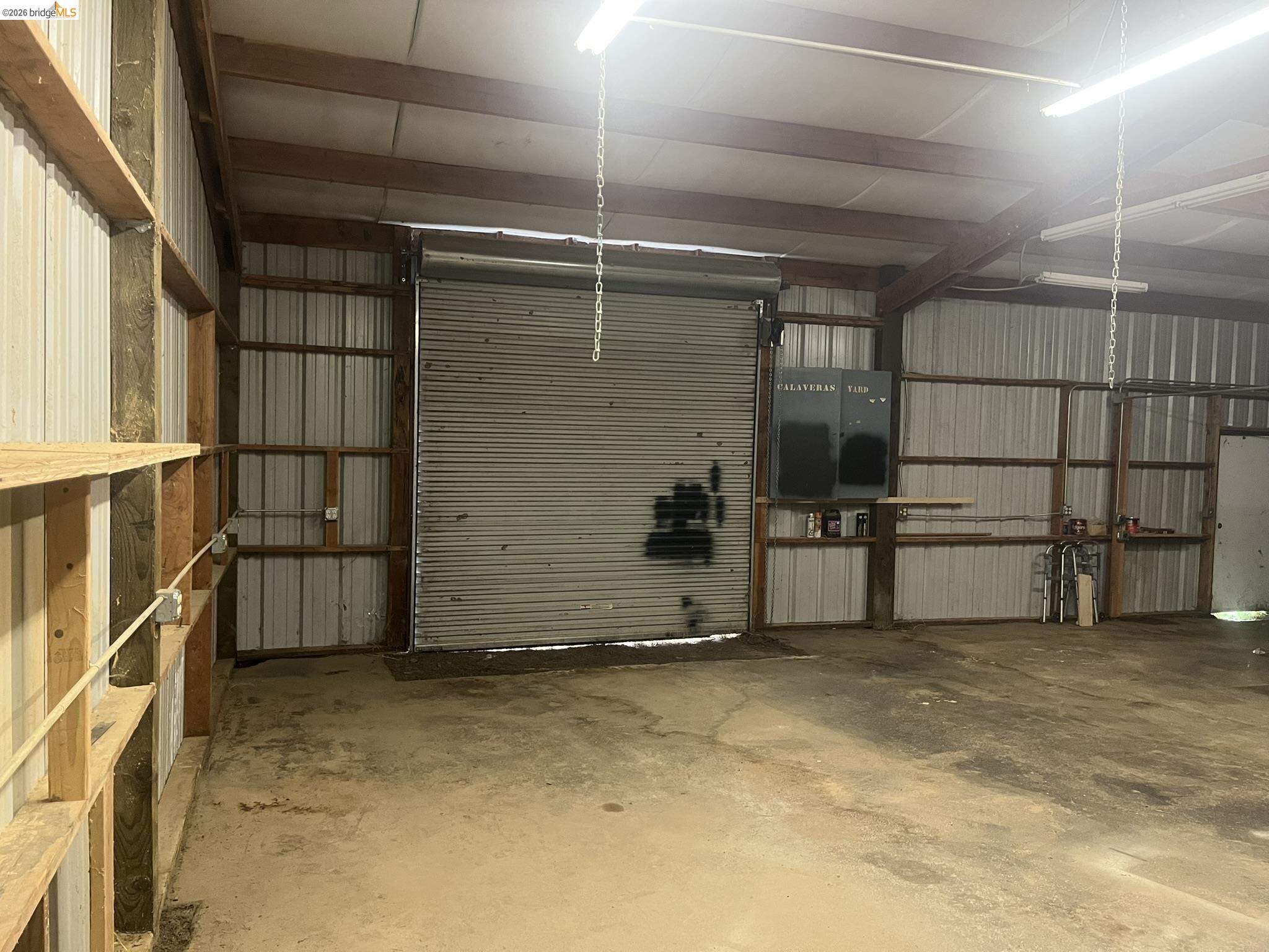 19644 Rawhide Road Sonora, CA 95370 - Photo 26 of 45 Garage with metal wall