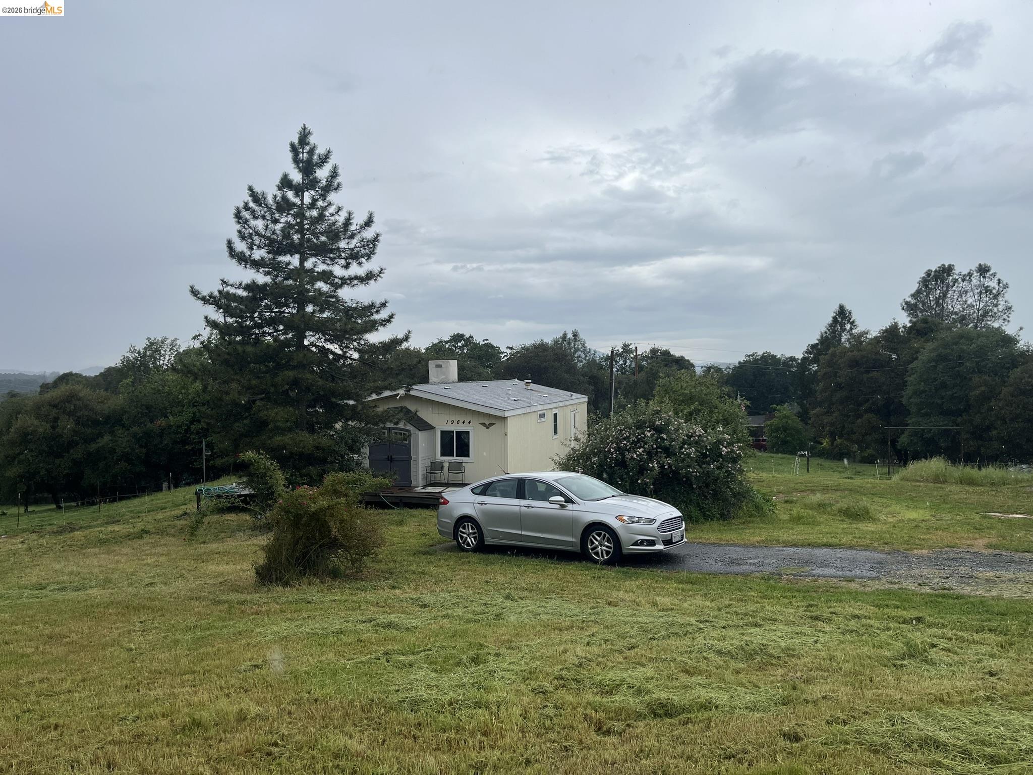 19644 Rawhide Road Sonora, CA 95370 - Photo 43 of 45 View of green lawn with a rural view