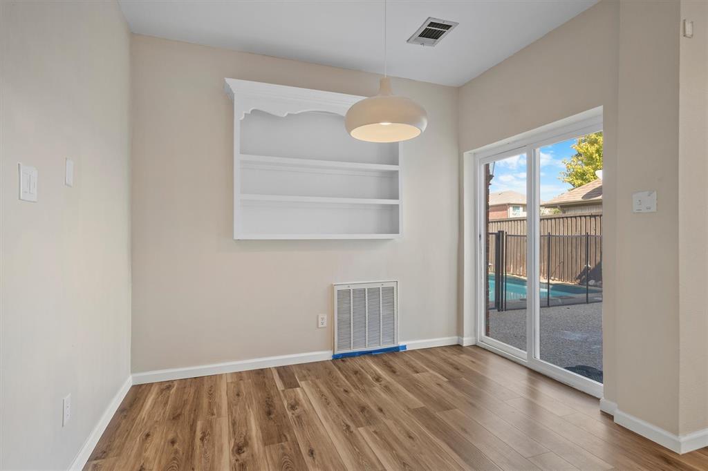 1719 Live Oak Lane Allen, TX 75002 - Photo 21 of 38 an empty room with windows and closet