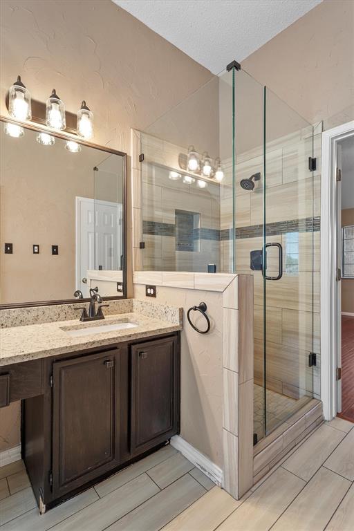 1719 Live Oak Lane Allen, TX 75002 - Photo 31 of 38 a bathroom with a double vanity sink mirror and double