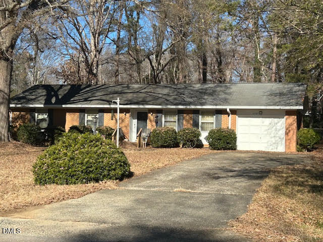 4404 Regis Avenue Durham, NC 27705 - Photo 3 of 4 a view of a house with a outdoor space