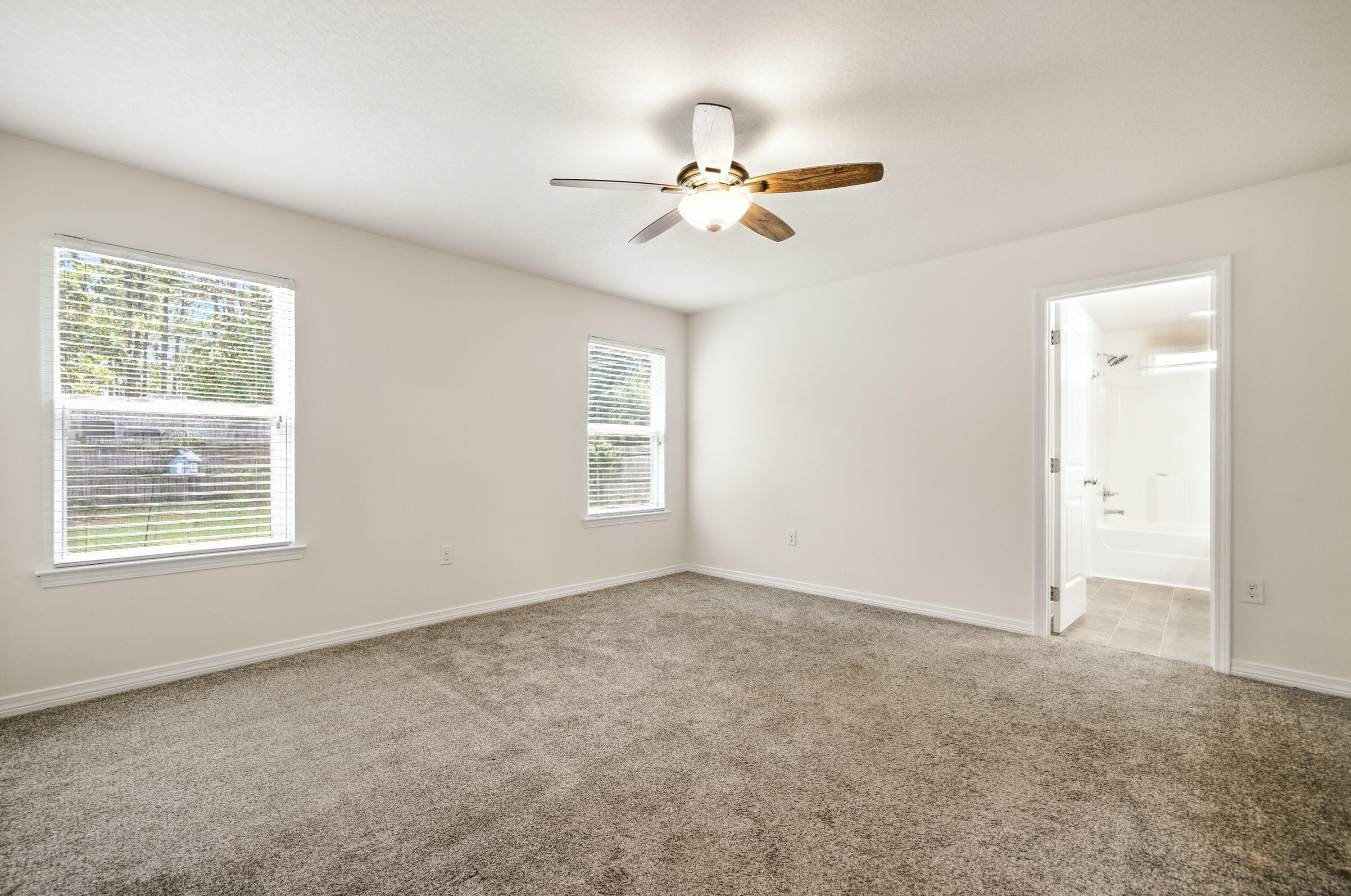 9207 Timber Lane Navarre, FL 32566 - Photo 18 of 24 a view of an empty room with a window