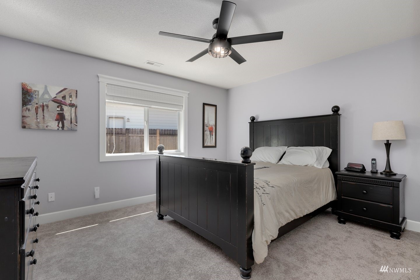 2607 Northeast 161st Street Ridgefield, WA 98642 - Photo 24 of 37 a bedroom with a bed and a window
