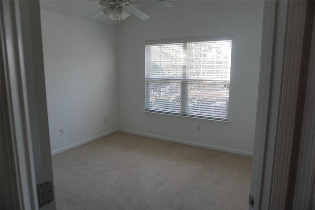 1802 Cascade Park Drive Southwest Atlanta, GA 30331 - Photo 16 of 21 a view of an empty room with a window
