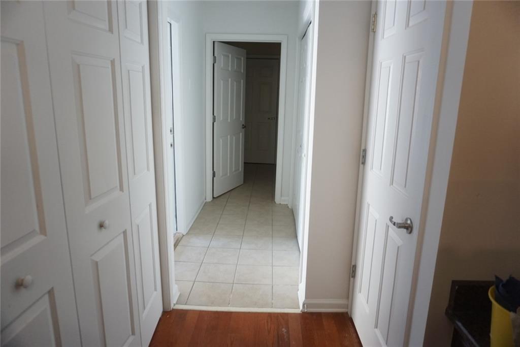 1802 Cascade Park Drive Southwest Atlanta, GA 30331 - Photo 17 of 21 a view of a hallway with wooden floor