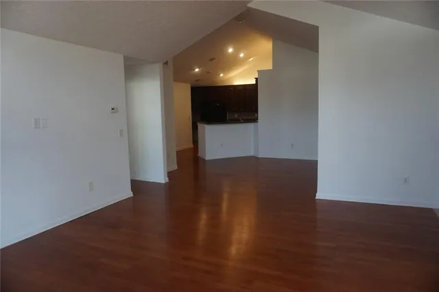 a view of a livingroom with wooden floor