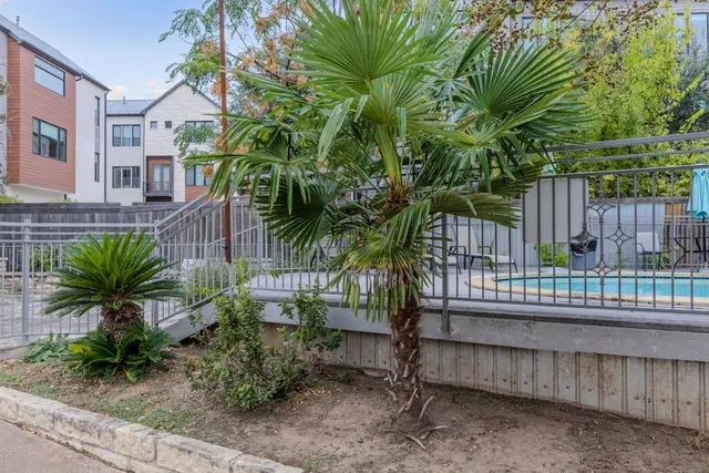 a view of a house with a street