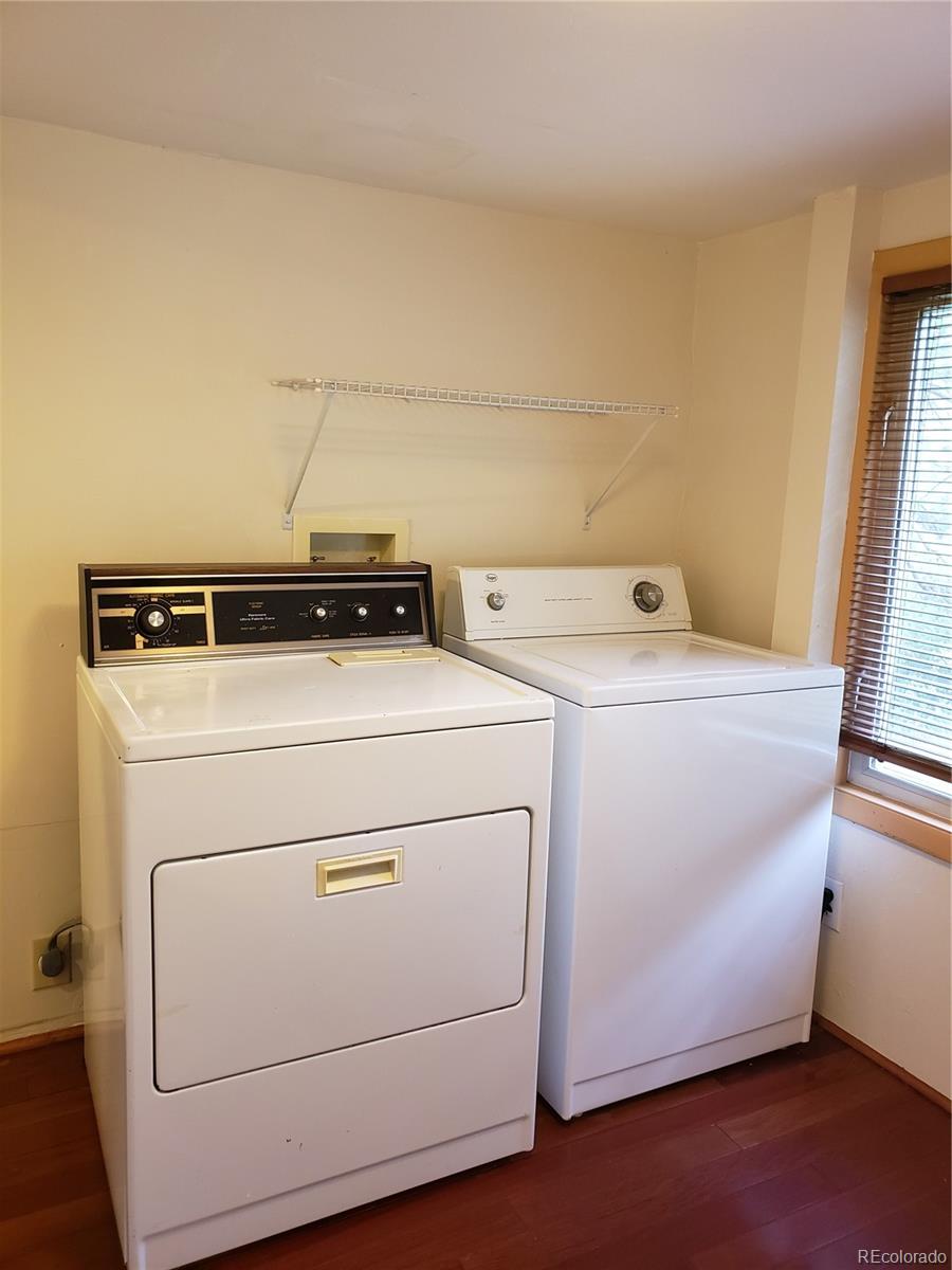 11769 Ranch Elsie Road Golden, CO 80403 - Photo 27 of 39 a utility room with dryer and washer