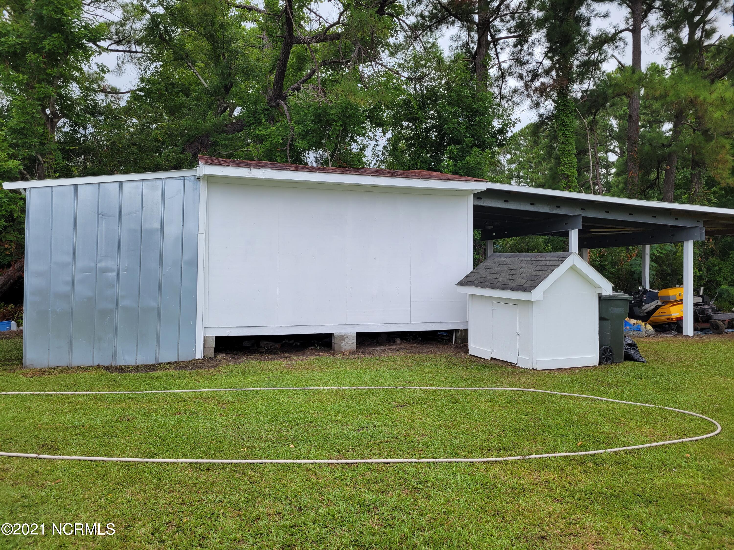 657 Straits Road Gloucester, NC 28528 - Photo 27 of 30 Exterior Shed