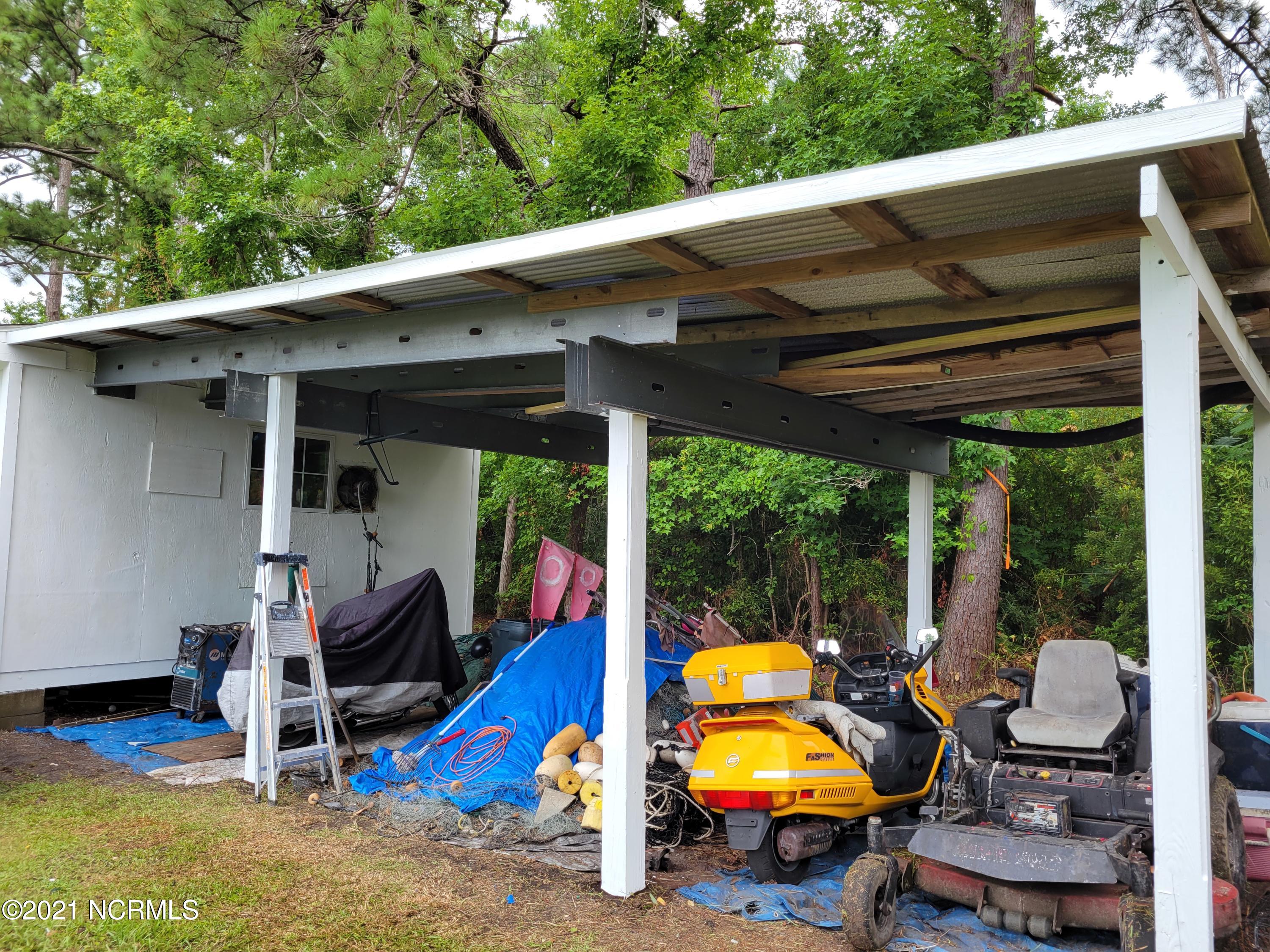 657 Straits Road Gloucester, NC 28528 - Photo 30 of 30 Covered Storage in Back Yard
