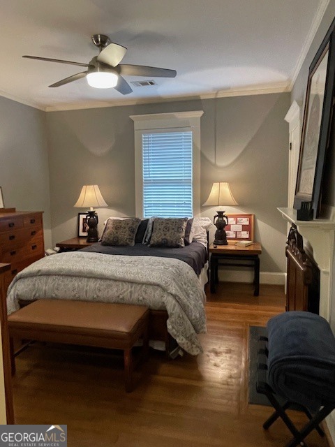 311 3rd Street Manchester, GA 31816 - Photo 11 of 61 a bedroom with bed and a tv