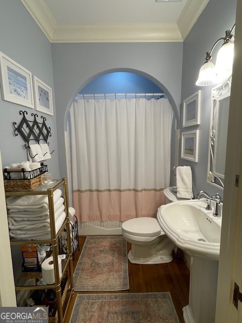 311 3rd Street Manchester, GA 31816 - Photo 14 of 61 a bathroom with a sink toilet and shower