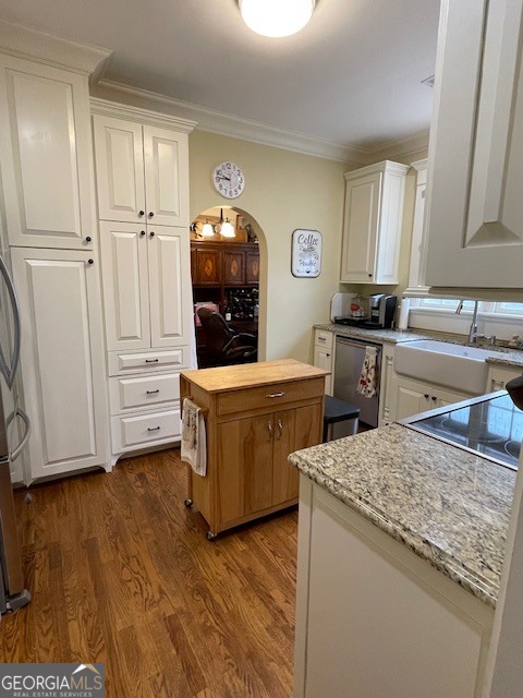 311 3rd Street Manchester, GA 31816 - Photo 22 of 61 a kitchen with a stove and a sink