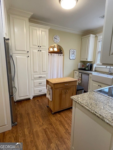 311 3rd Street Manchester, GA 31816 - Photo 24 of 61 a kitchen with a sink and a stove top oven